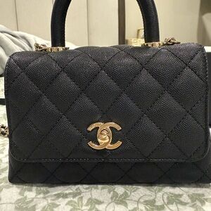 Chanel Black Quilted Mini Bag with Gold Accents